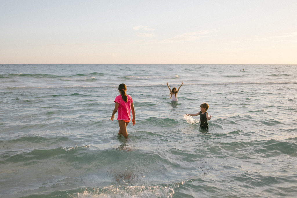 Laurie Baker takes photos of children having fun and candid photography