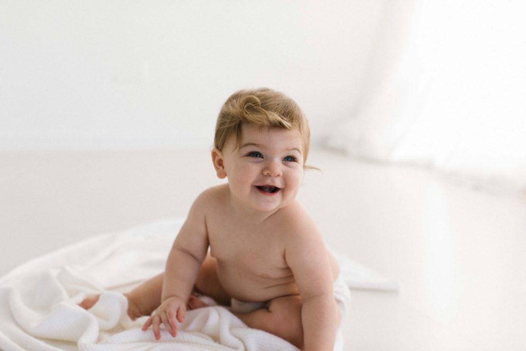 Candid and unposed baby imagery Chicago newborn, baby, and family photographer Elle Baker Photography 