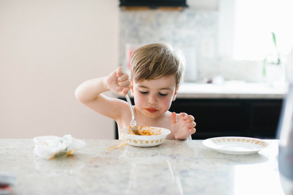 Child eating spaghetti lifestyle shoot The art of the everyday lifestyle photography