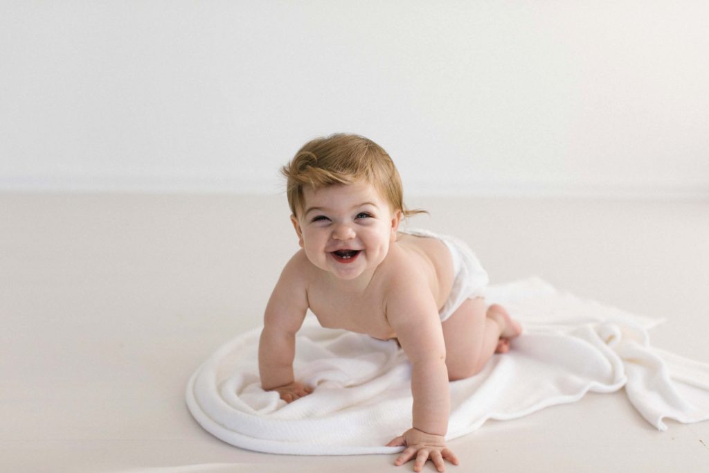 Candid and unposed baby imagery Chicago newborn, baby, and family photographer Elle Baker Photography 