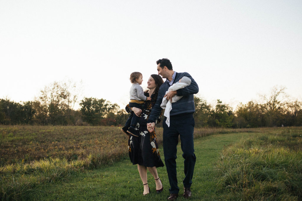 Naperville Illinois Forest Preserve, family of four walking and holding hands, posing ideas for family session