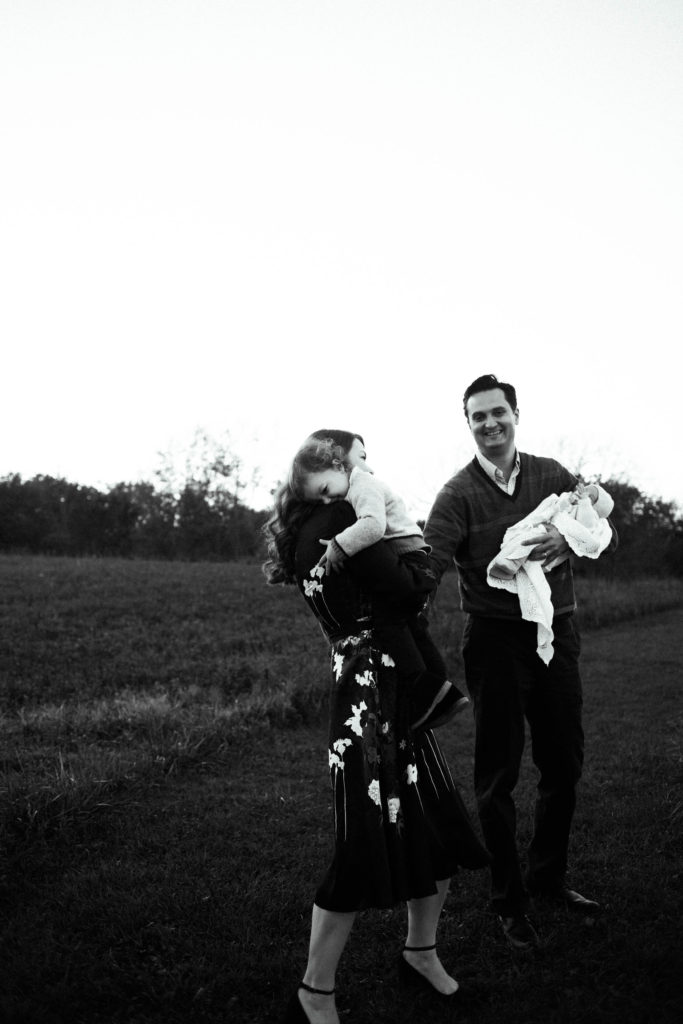 Naperville Illinois Forest Preserve photos by Elle Baker Photography, mother comforting son during newborn lifestyle session, posing ideas for large families