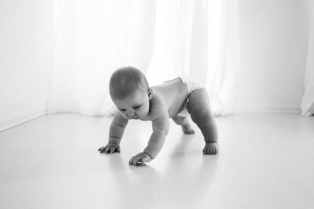 Detail shots during a baby session, Elle Baker Photography, La Grange Illinois baby photographer, baby boy crawling in white studio