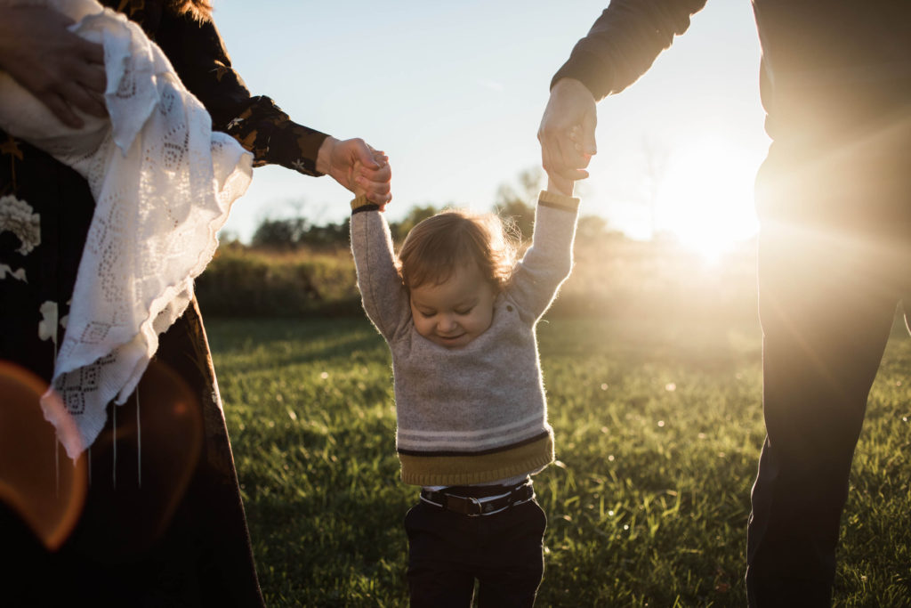 Naperville Illinois Forest Preserve, Photos by Elle Baker Photography, Family of four walking and swinging child, tips on how to shoot at sunset