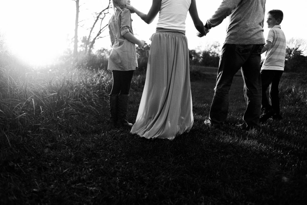 Hickory Creek Junction family session, Photos by Elle Baker Photography, New Lenox IL, family of four walking in field 