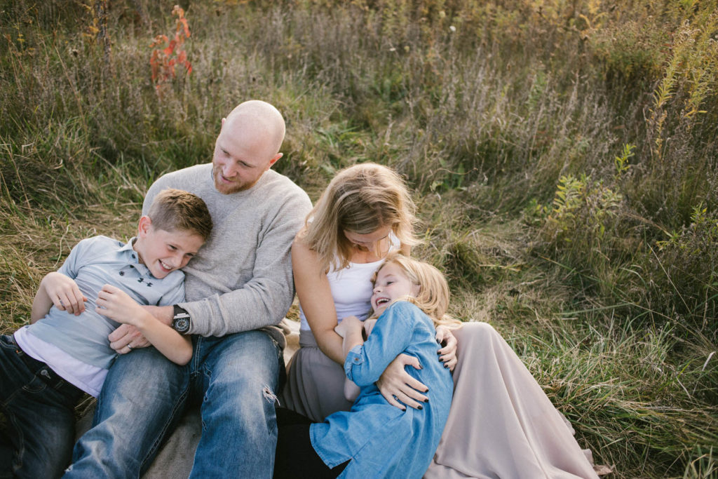 Hickory Creek Junction family session, Photos by Elle Baker Photography, New Lenox IL, family of four sitting in field 