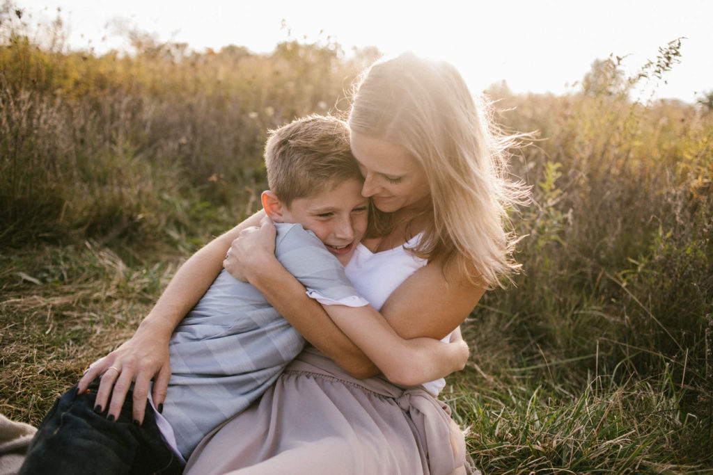 Hickory Creek Junction family session, Photos by Elle Baker Photography, New Lenox IL, mom cuddling young boy, posing ideas for older children