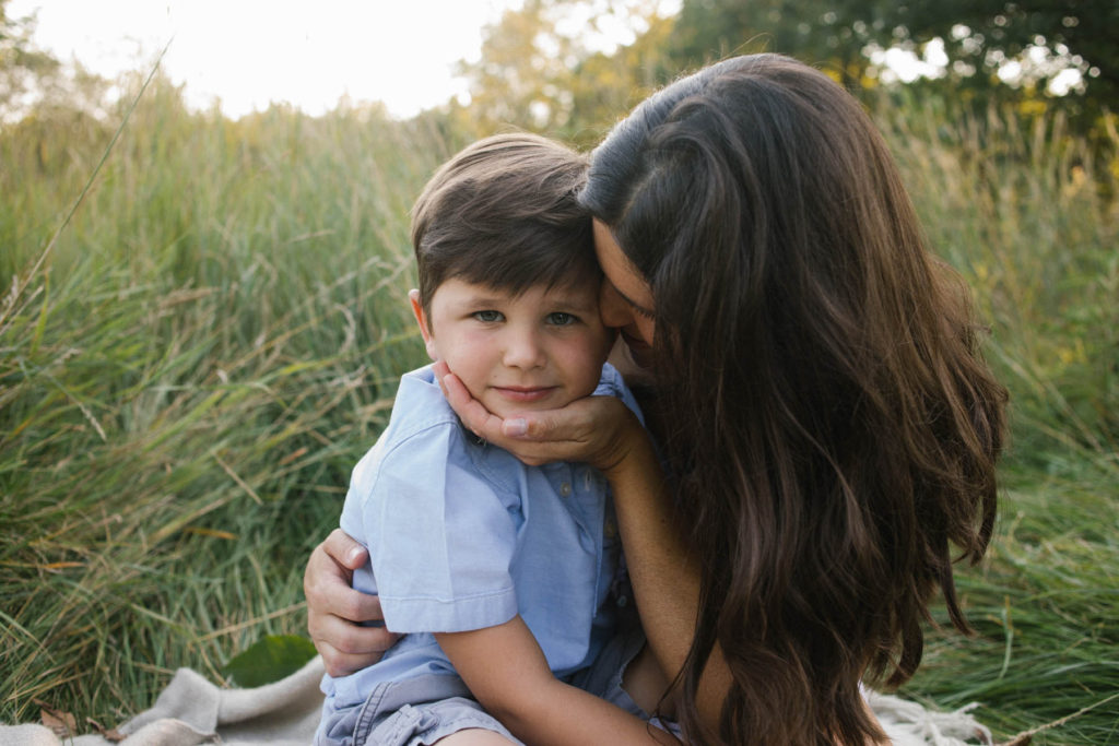 Hickory Creek Preserve in Mokena, IL, Photo by Elle Baker Photography, boy cuddling with mother during family session