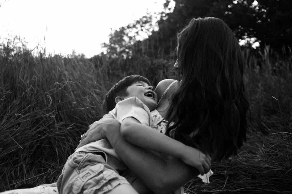 Hickory Creek Preserve in Mokena, IL, Photo by Elle Baker Photography, boy cuddling with mother during family session