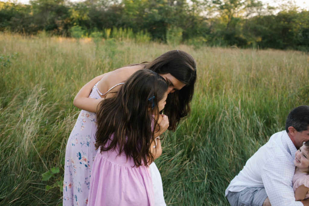 Hickory Creek Preserve in Mokena, IL, Photo by Elle Baker Photography, mom and daughter embrace during family lifestyle session