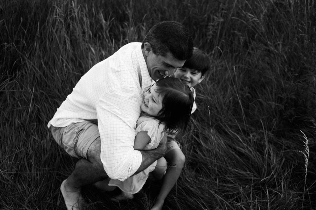 Hickory Creek Preserve in Mokena, IL, Photo by Elle Baker Photography, dad wrestling with children during family photo session