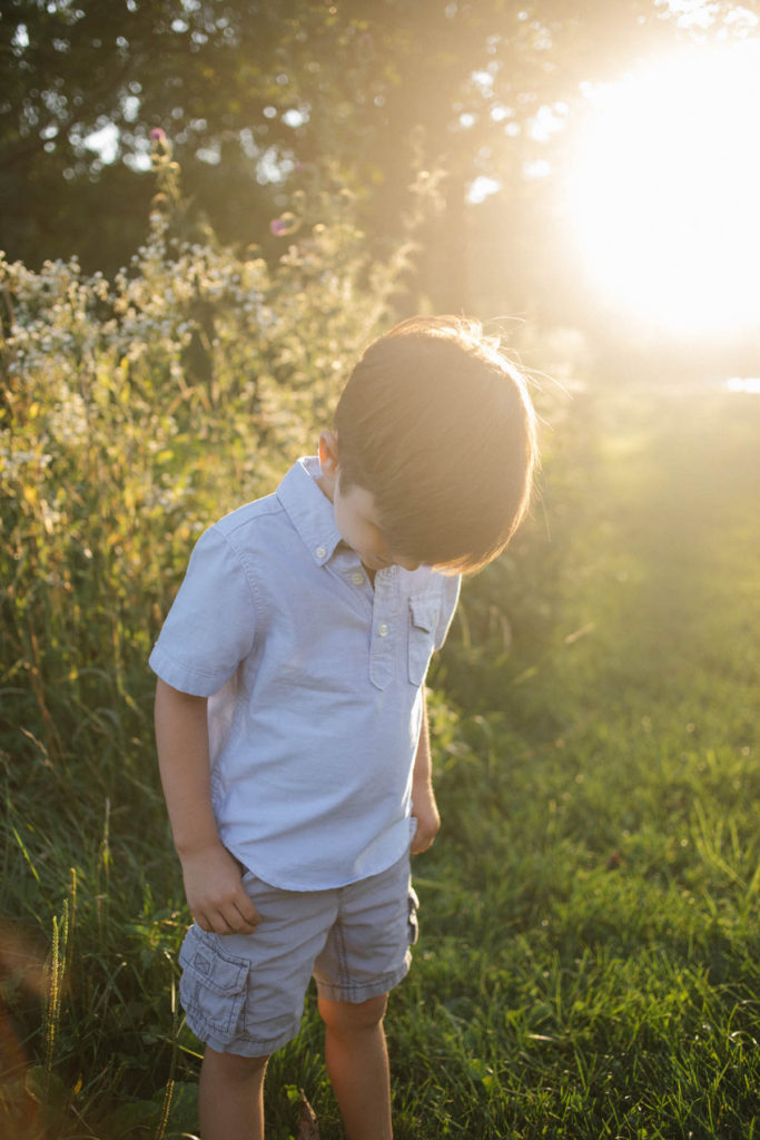 Hickory Creek Preserve in Mokena, IL, Photo by Elle Baker Photography, little boy with his hands in his pockets during outdoor sunset session