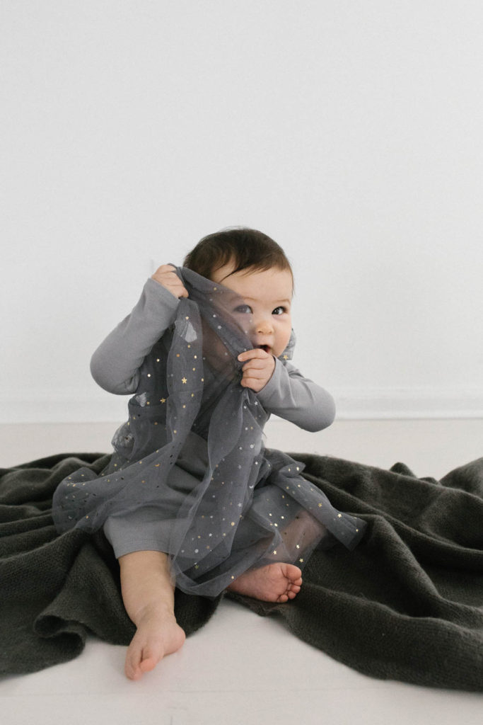 Family Photographer in Naperville, Illinois, Photo by Elle Baker Photography, baby girl modeling Ele story gray glitter tulle dress, what to wear for holiday inspired session