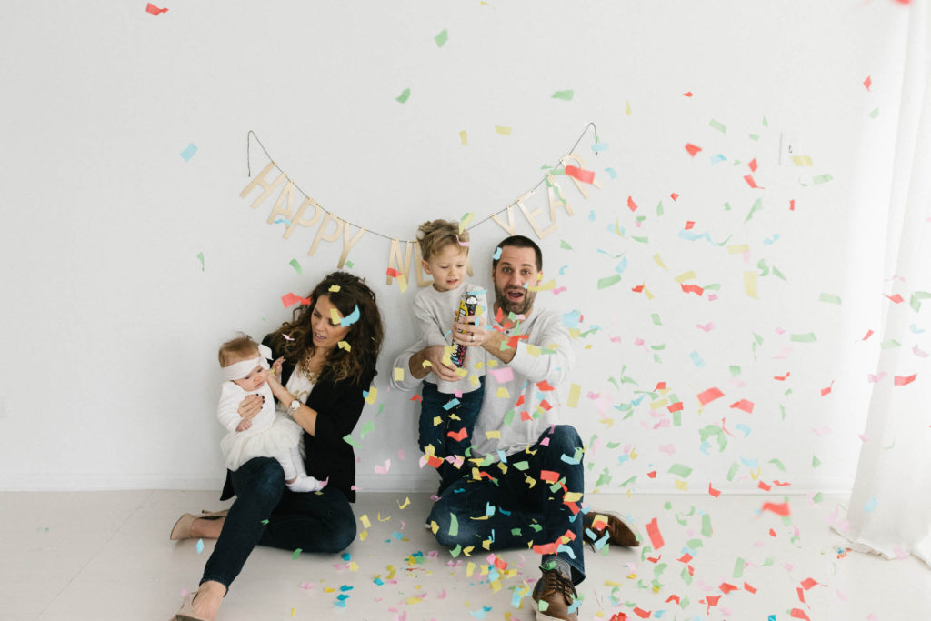 New Year's Photo Session, Photos by Elle Baker Photography, studio family session uses confetti at New year's themed session