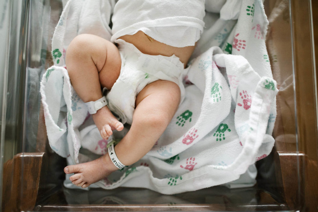 Chicago newborn photographer, Laurie Baker captures newborn baby boy 