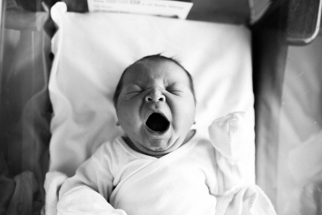 Newborn yawning during Fresh 48 hospital session with Elle Baker Photography 