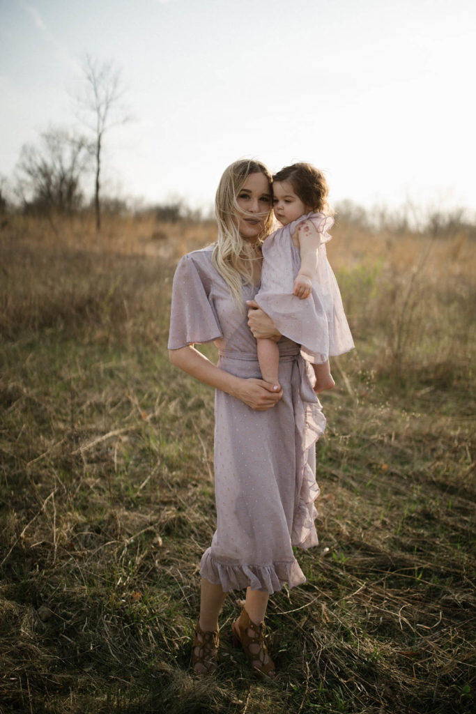 mother and daughter photo wearing purple lavender dresses