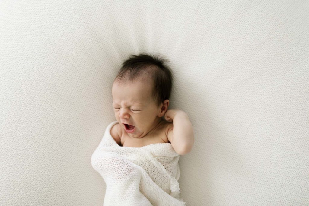 newborn baby yawning, photo by Elle Baker Photography 