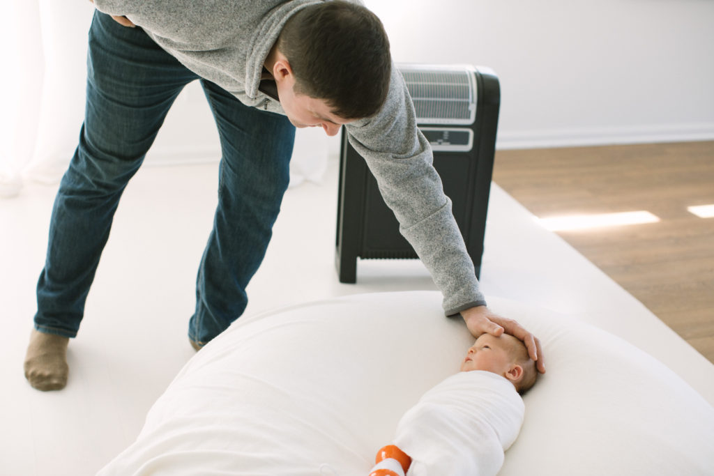Behind the scenes during newborn session Maternity and newborn photographer Elle Baker Photography