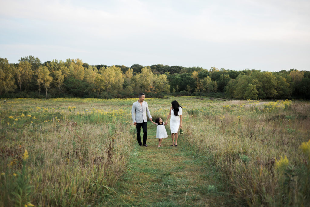 Outdoor sunset photo of family walking candidly down a path Mokena Illinois Maternity and Family Photographer 