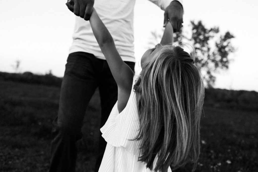 let's go fly a kite | Elle Baker Photography | black and white image of little girl and her daddy 