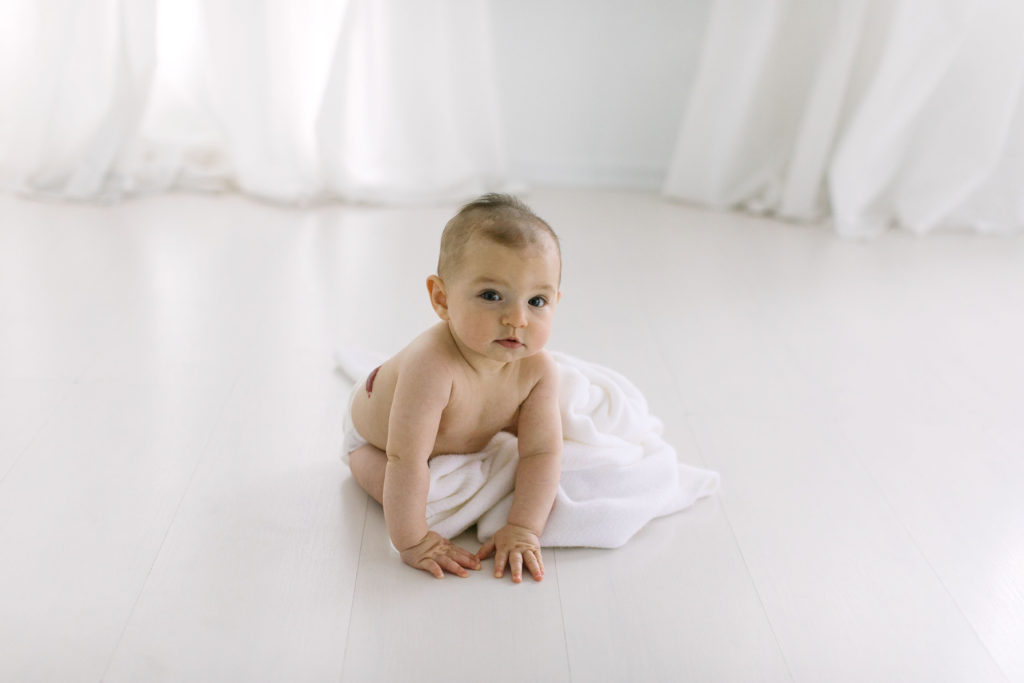 Baby Led Sitter Session in Homer Glen studio little girl sitting up with white blanket