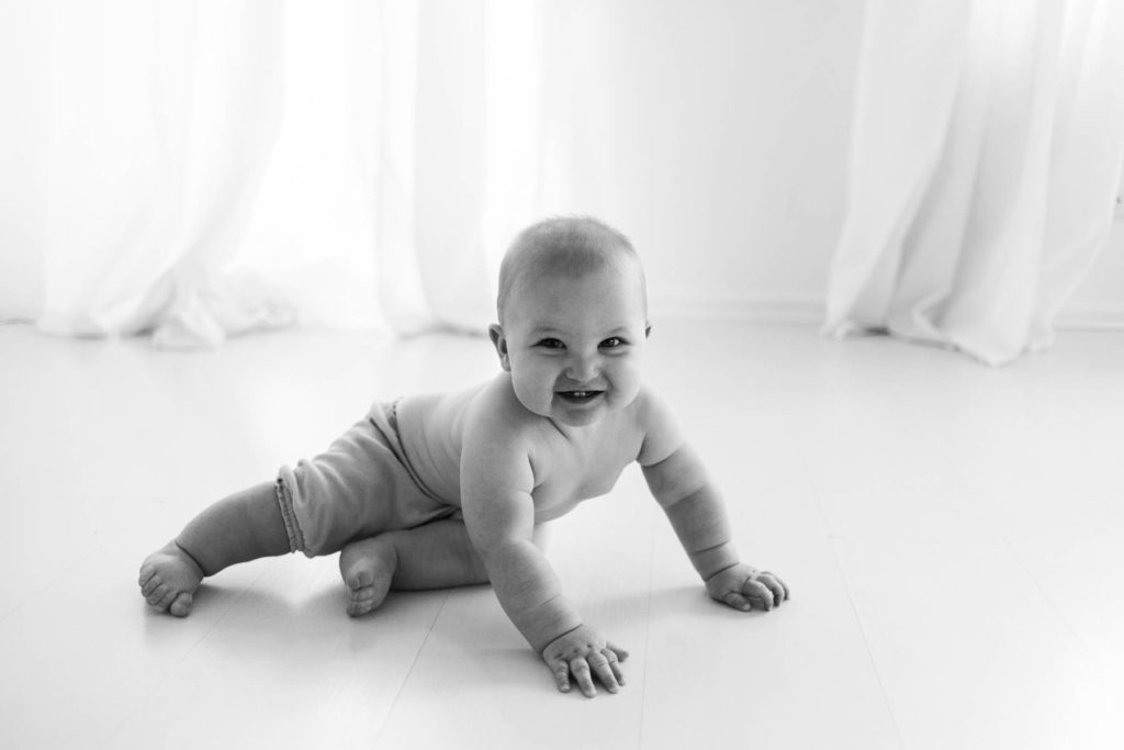 Tips For a Successful Baby Milestone Session, Chicago baby photographer, Photos by Elle Baker Photography, baby boy smiling in black and white photo