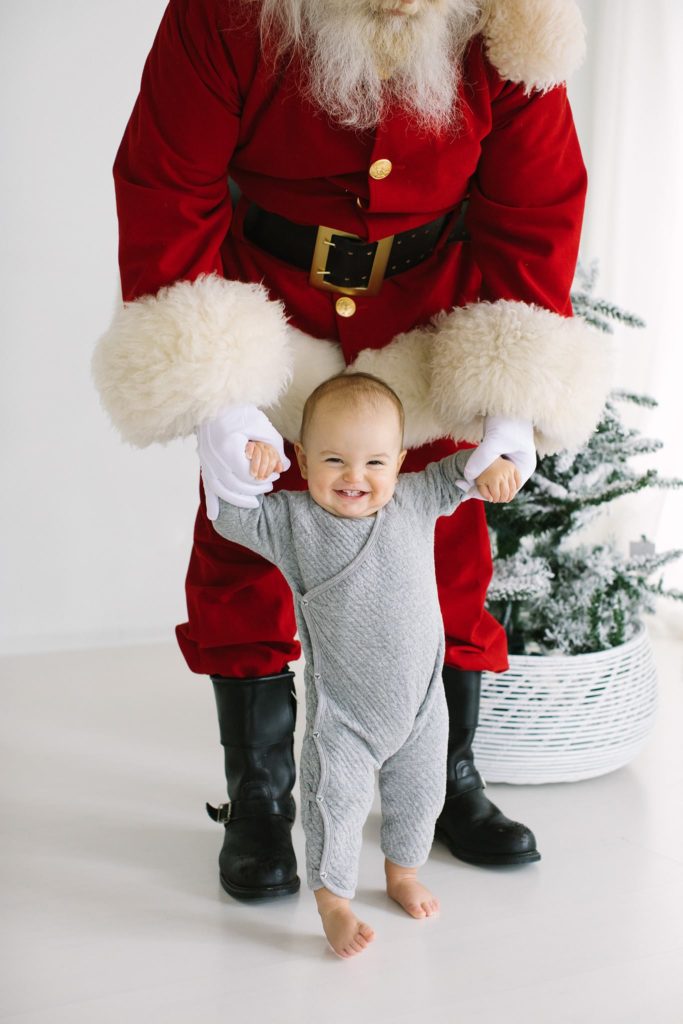 Santa Session wardrobe ideas, Chicago family photographer, Elle Baker Photography, young toddler boy holding santas hands