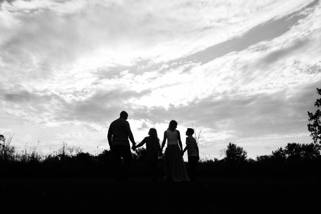 Hickory Creek Junction family session, Photos by Elle Baker Photography, New Lenox IL, family of four walking in field