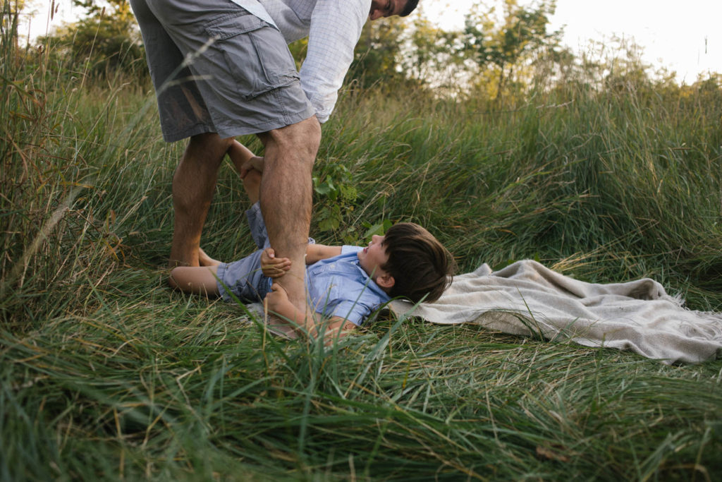 Hickory Creek Preserve in Mokena, IL, Photo by Elle Baker Photography, boy wrestling with father during candid family session