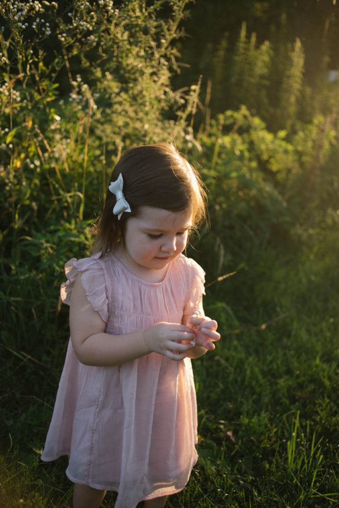 Hickory Creek Preserve in Mokena, IL, Photo by Elle Baker Photography, little girl playing with a flower