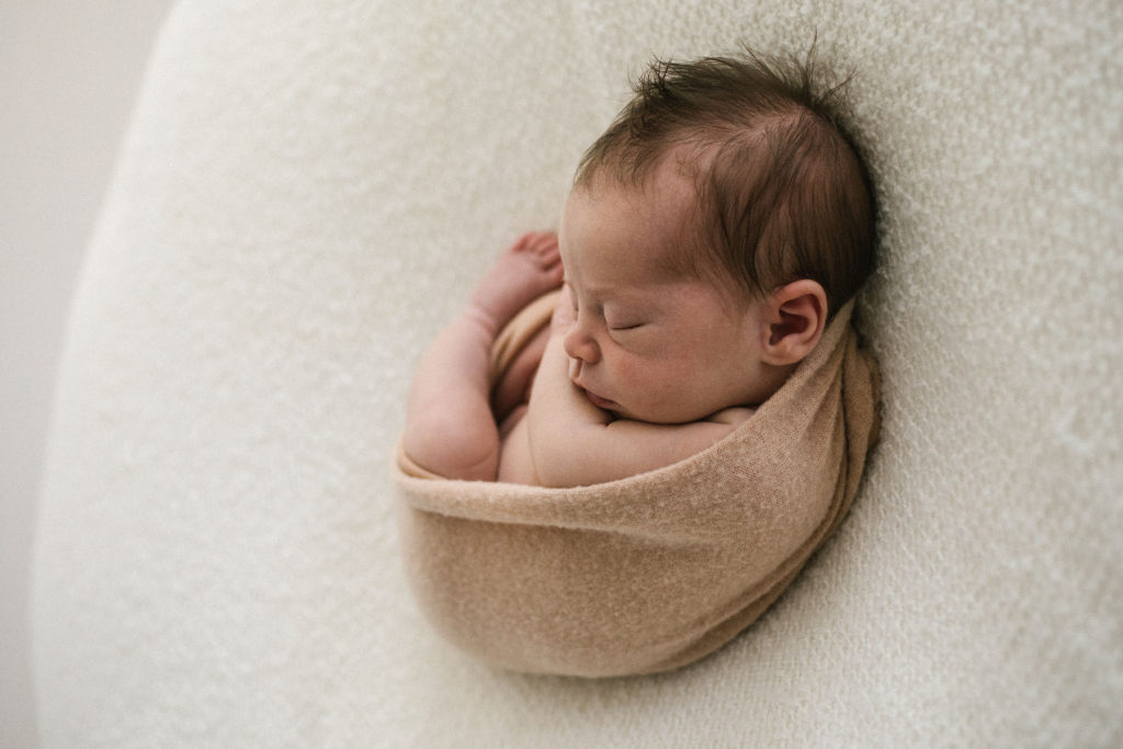 Newborn photographer in Chicago, IL, Photo by Elle Baker Photography, simple and natural newborn photo of a baby sleeping