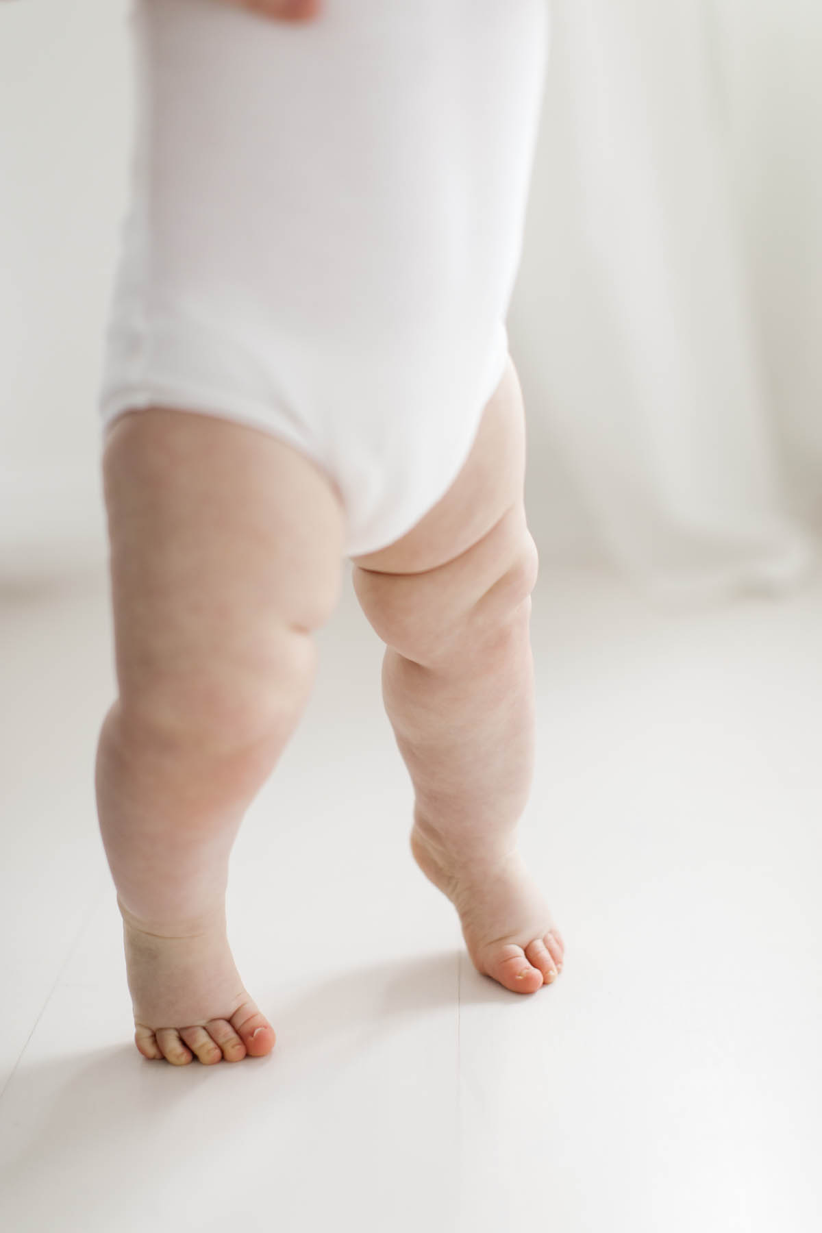 detail photo of baby boys chubby legs