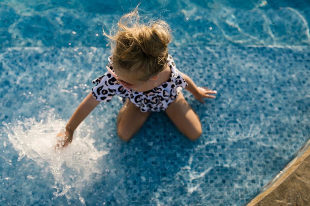 little girl in pool 