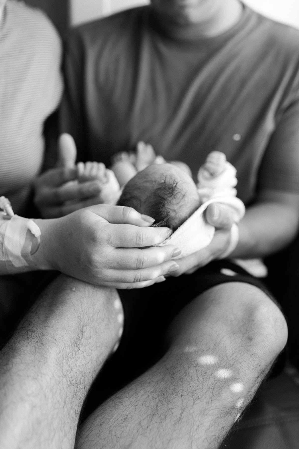 Chicago's best newborn photographer captures beautiful image of mother holding her baby 