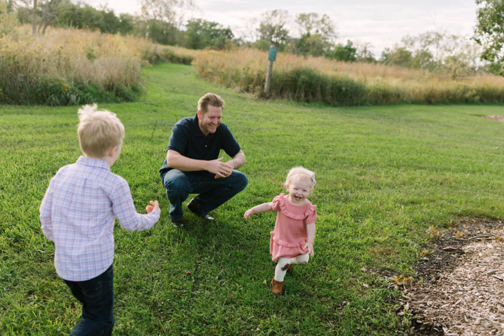 New Lenox Family Photographer captures family of four running and playing 