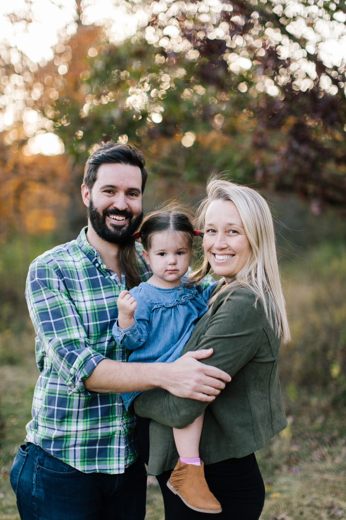 family of three almost four during family mini session 