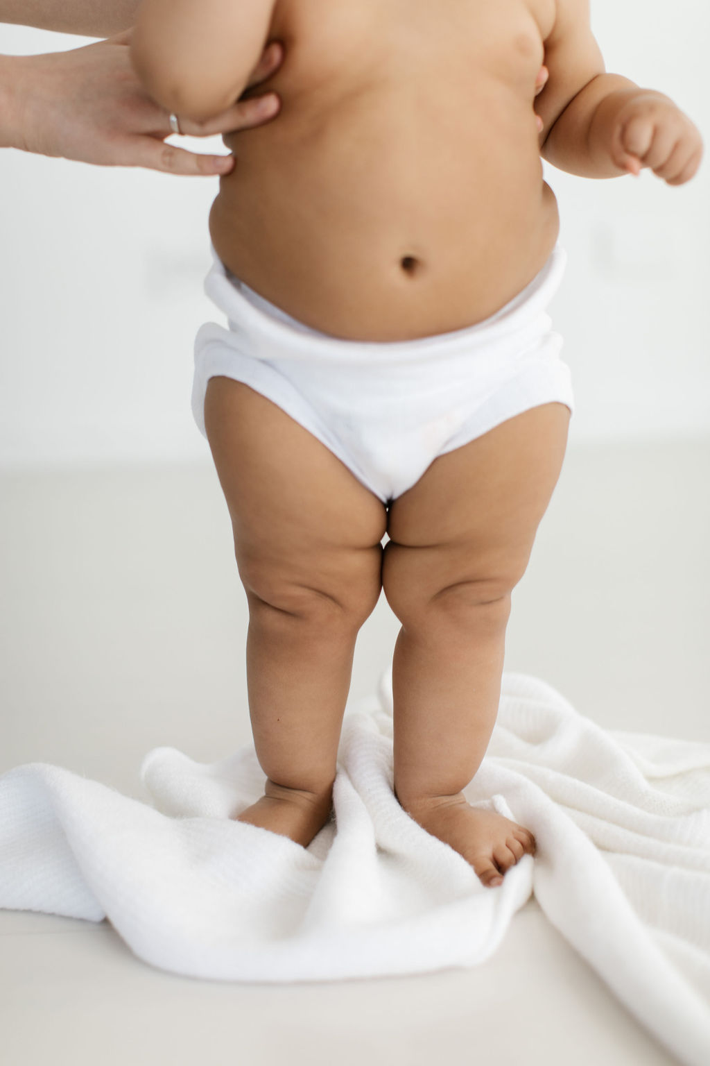 detail photo of chubby baby legs